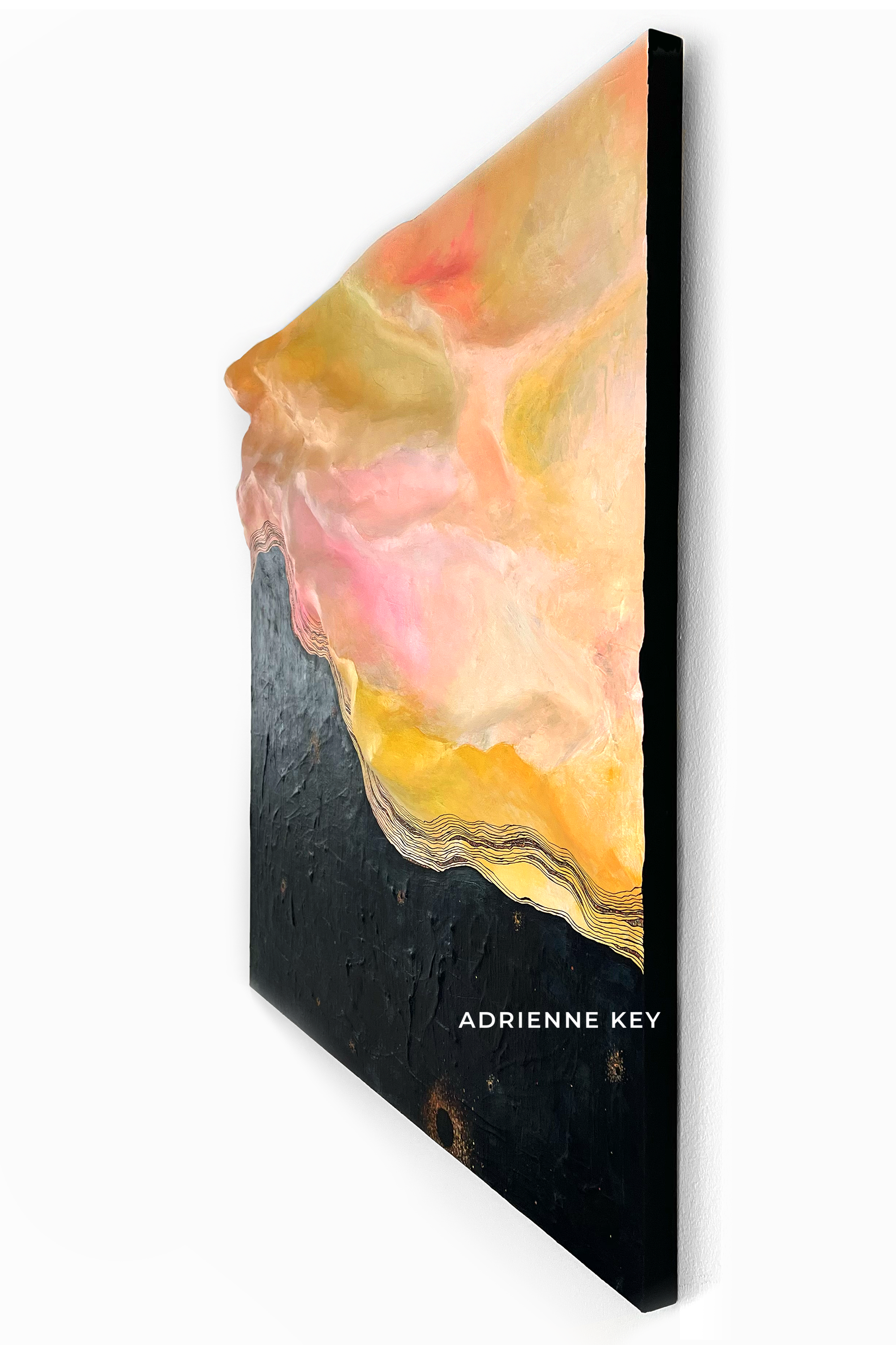 3/4 detail view of a 48x48 inch sculpted abstract wall art with bright colors at the top and dark colors at the base