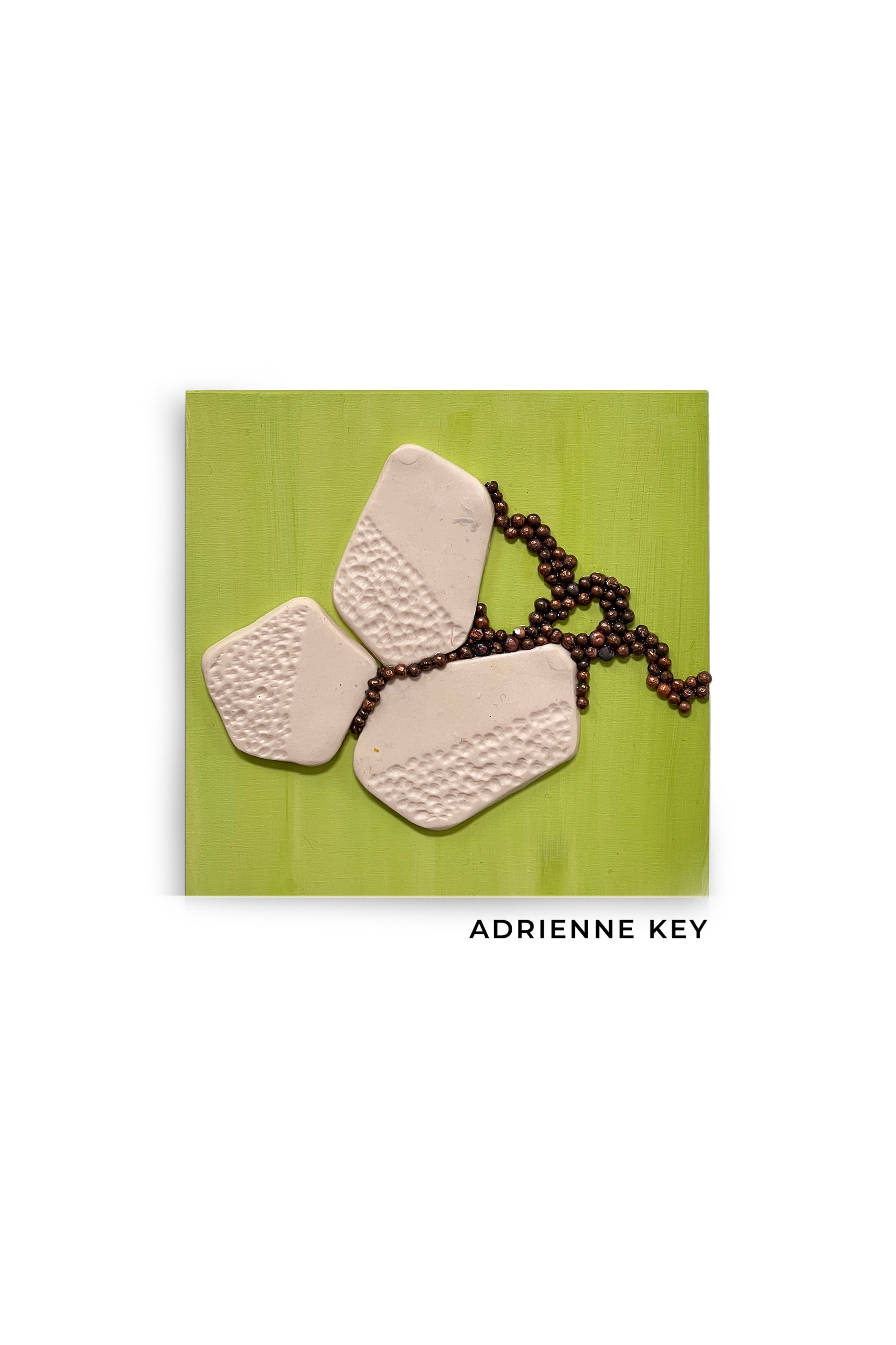 5x5 inch wall art with a green wood based, tan polymer pieces and clusters of copper beads