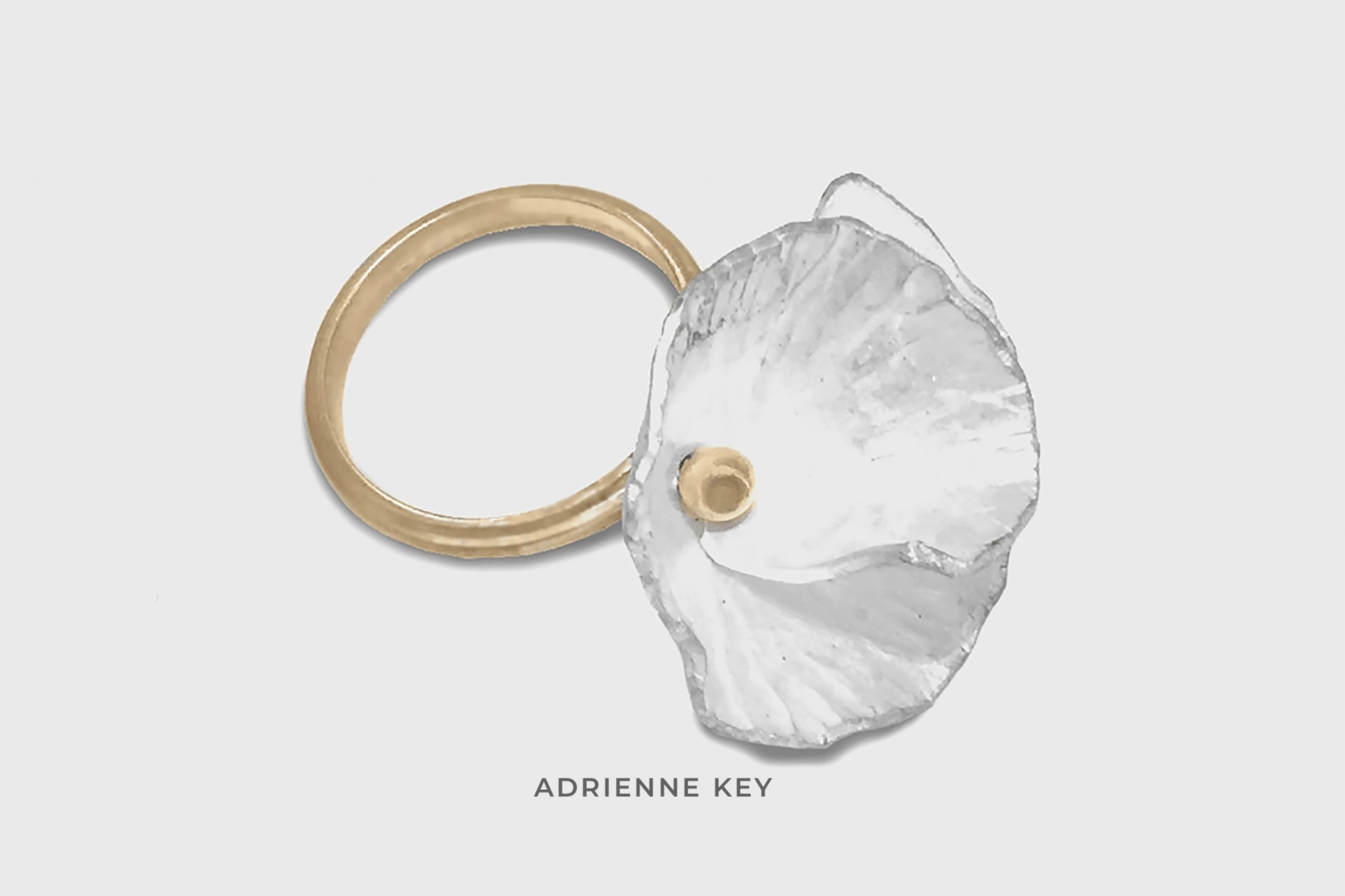 Fine silver hand formed flower ring on a 14k yellow gold band with a 14k yellow gold center nub