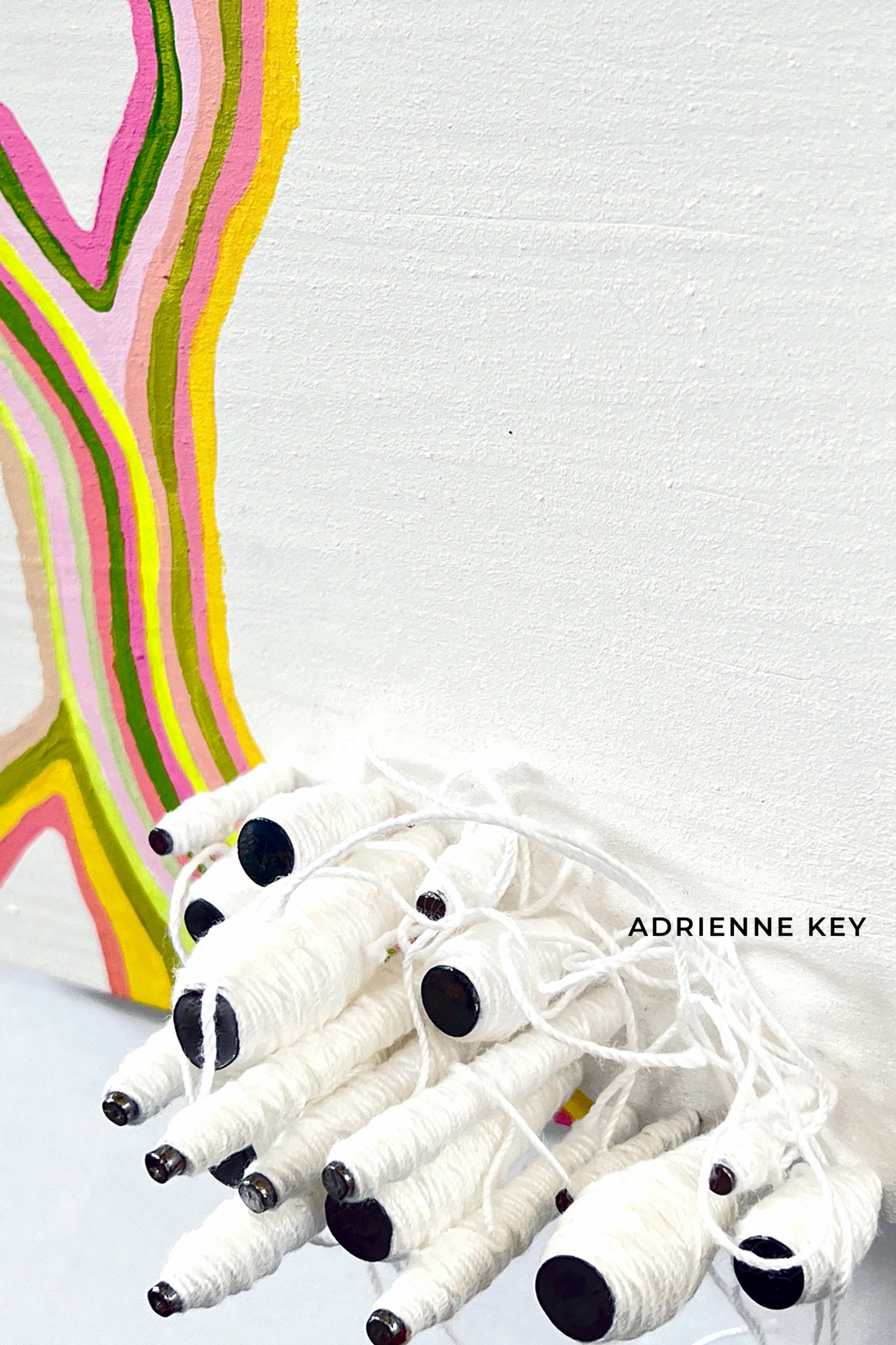 Detail of original artwork with nails wrapped in white cotton string