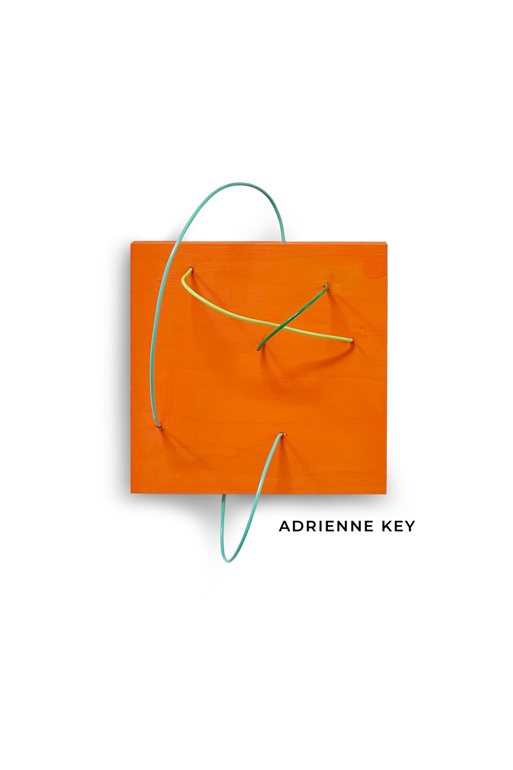 4x4 inch art with an orange wood base with coated blue and teal wires protruding out