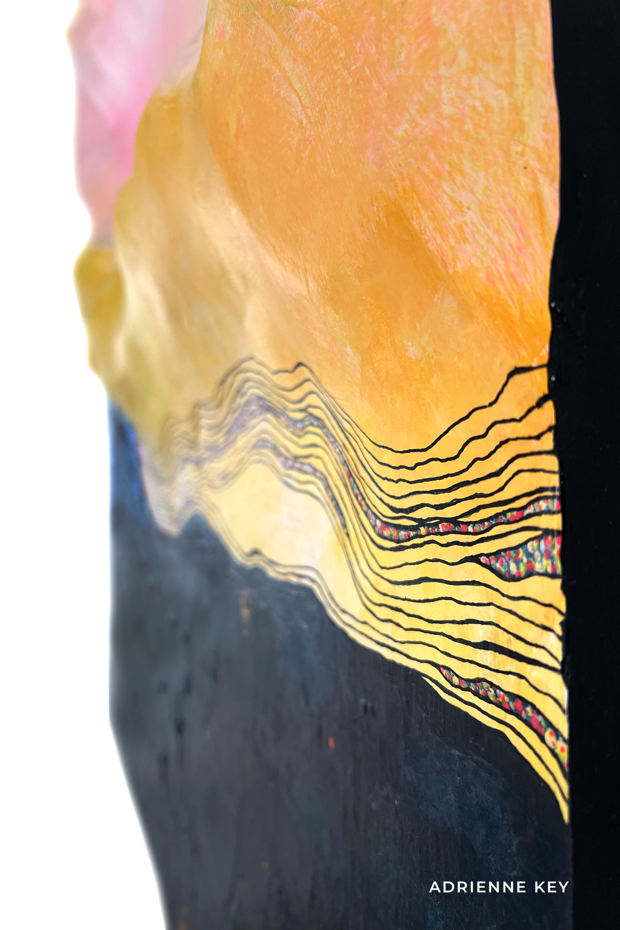 Detail of 48x48 inch sculpted abstract wall art with bright colors at the top and dark colors at the base